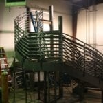 green railing and stair set